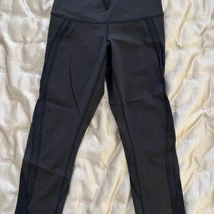 Black high waisted lululemon leggings with ankle detail size 8